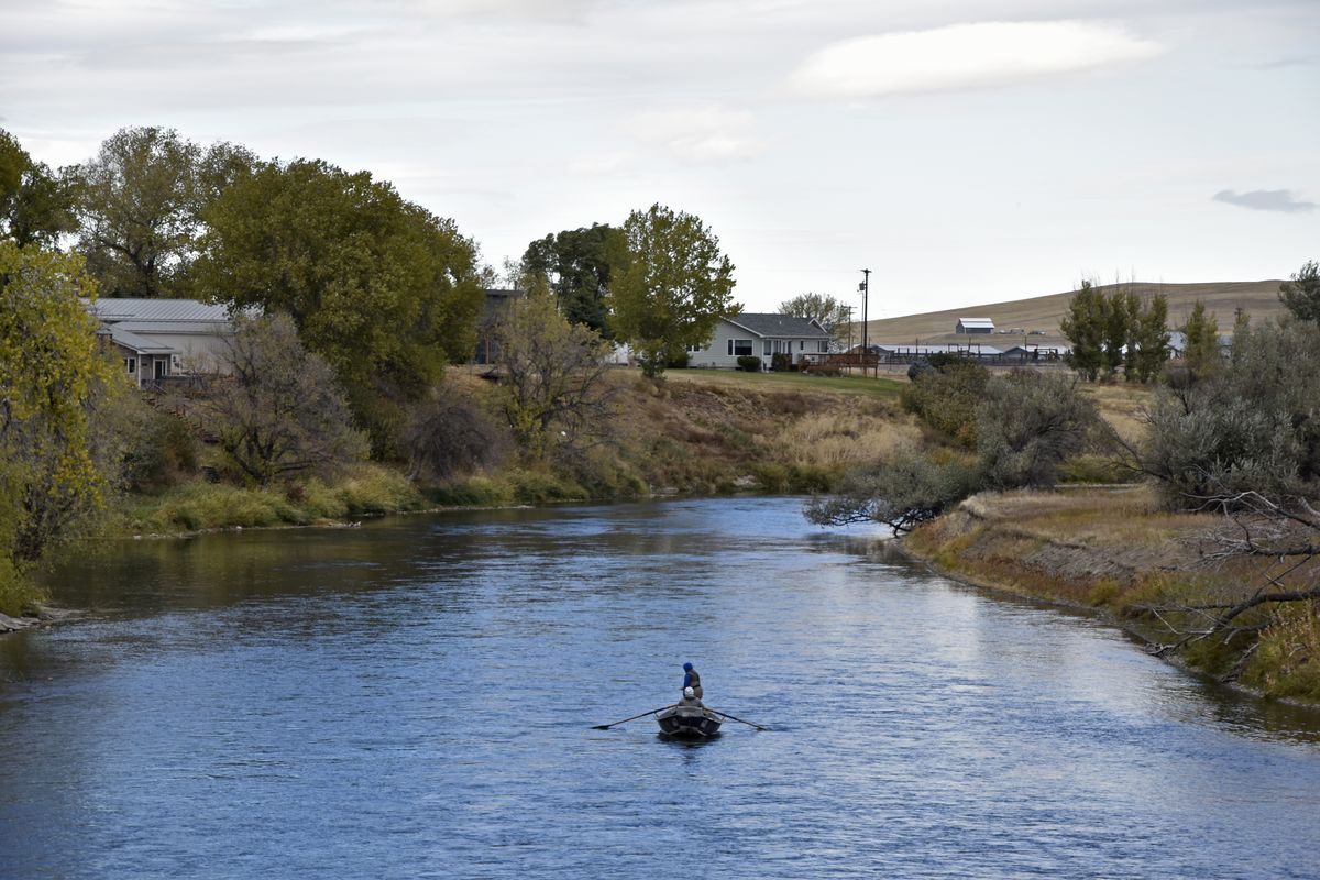 The Missouri River flows through Cascade, Mont., on Friday, Oct. 15, 2021. Incorporated 110 years ago, Cascade has changed little since then -- aside from a recent upgrade of the town's water and sewage pipes. For the first time in 30 years, the Census has awarded Montana a second seat in Congress and a commission is being tasked with determining how to divide the state into two congressional districts.  (Iris Samuels)