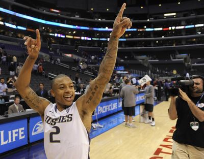 Washington’s Isaiah Thomas celebrates after an 89-87 win over Washington State in the 2011  Pac-10 Tournament. (Chris Pizzello / AP)