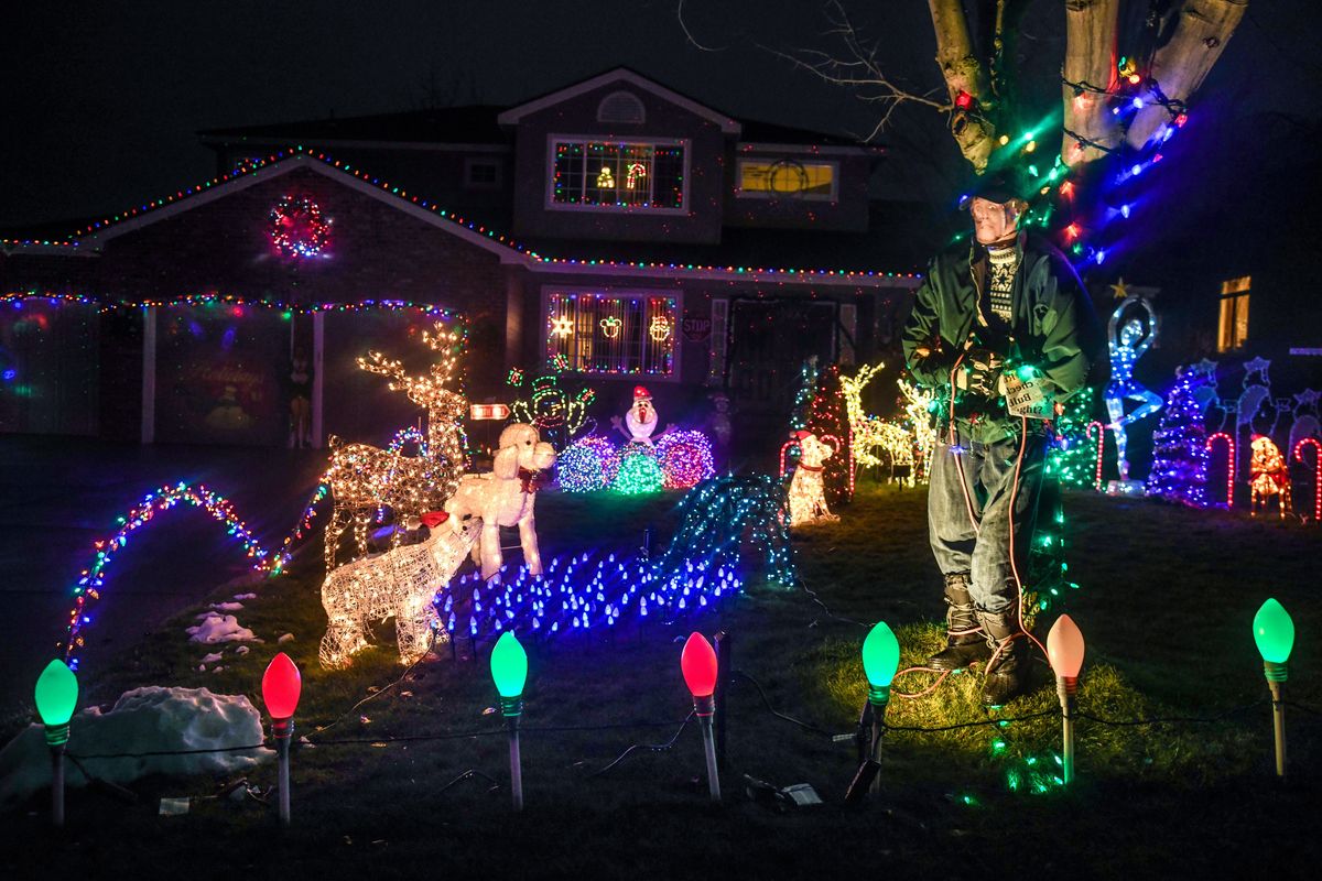 The Friends of the Pavillion Park are doing a holiday lighting contest for the first time this year as a fundraiser for their annual summer programs in the park, including the Fourth of July concert and fireworks show. This home at 23221 E Settler Drive features a Clark Griswold character in the front yard. (Dan Pelle / The Spokesman-Review)