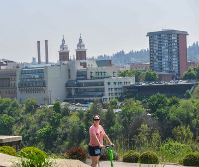 Smoke and haze from Canadian wildfires shroud the Cathedral of St. John the Evangelist, left, The Steam Plant stacks and the Cathedral of Our Lady of Lourdes steeples, Friday, May 19, 2023, in Spokane.  (DAN PELLE/THE SPOKESMAN-REVIEW)
