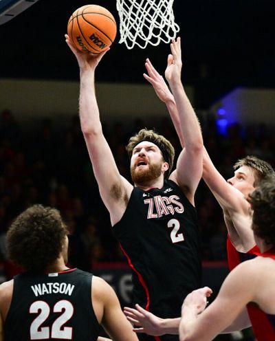 Gonzaga forward Drew Timme fights to the rim against the Saint Mary’s Gaels during the first half of Saturday’s West Coast Conference game at the UCU Pavilion in Moraga, Calif.  (Tyler Tjomsland / The Spokesman-Review)