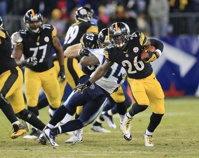 The Steelers’ Le’Veon Bell rushed for 204 yards and a touchdown in a win over the Titans. (Associated Press)