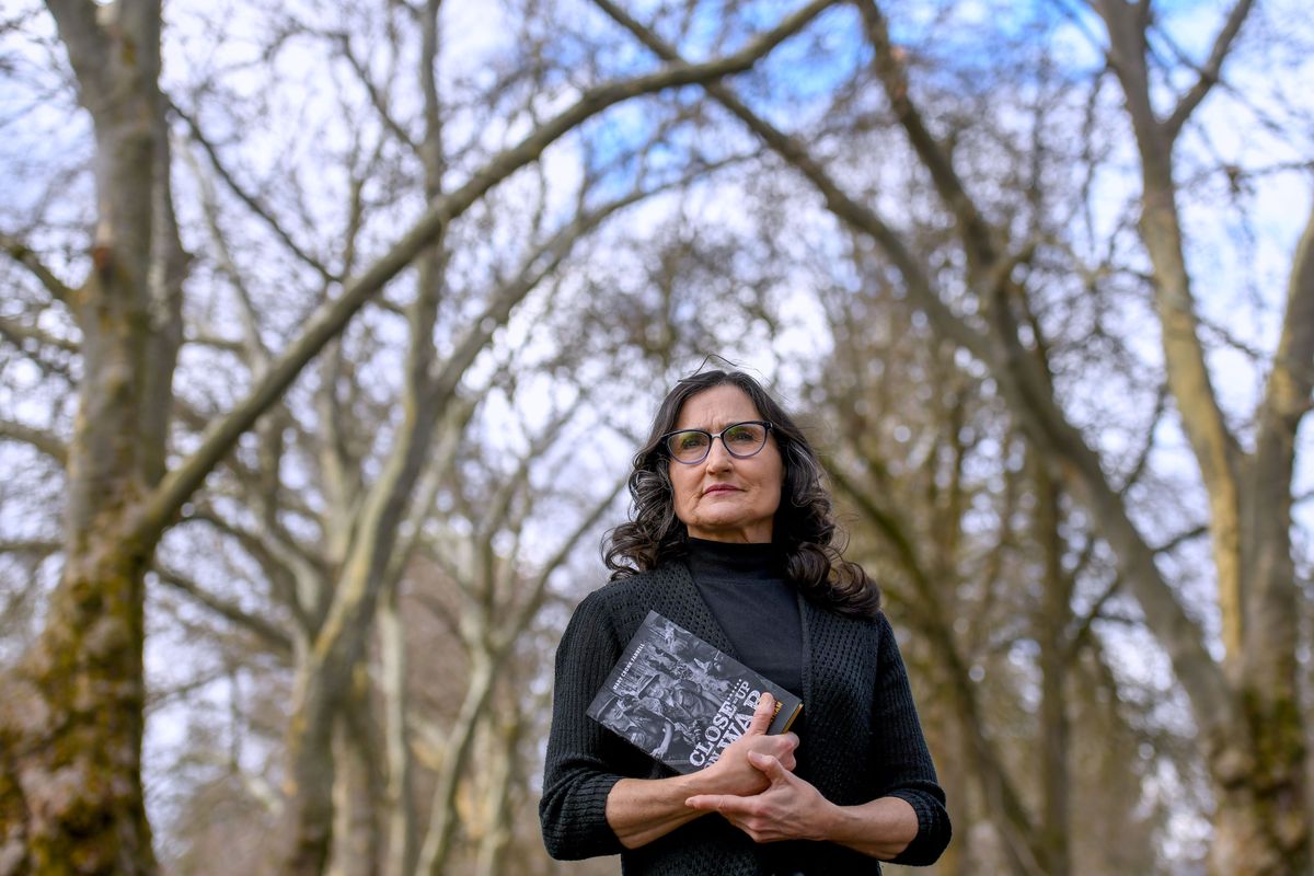 Mary Cronk Farrell, author of “Close-Up on War: The Story of Pioneering Photojournalist Catherine Leroy in Vietnam,” a book about Leroy’s time at work during the Vietnam War, is photographed near her home in Spokane on Tuesday.  (Kathy Plonka/The Spokesman-Review)