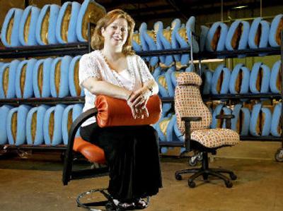 
Rebecca Boegnik sits on the ABStool at the Netural Posture, Inc. factory in Bryan, Texas. Boenigk, founder and CEO of Neutral Posture, Inc., has been forced to raise prices to compensate for higher energy costs. 
 (Associated Press / The Spokesman-Review)