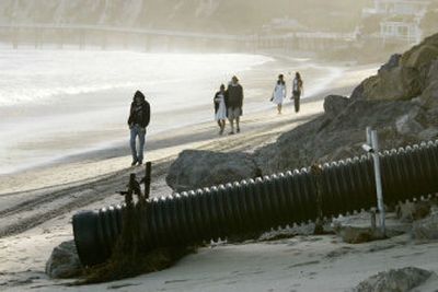 
A storm drainage pipe is seen in Paradise Cove in September in Malibu, Calif. Malibu's septic system is the main suspect behind its fetid waters, and county officials will soon be testing the seawater.
 (Associated Press / The Spokesman-Review)