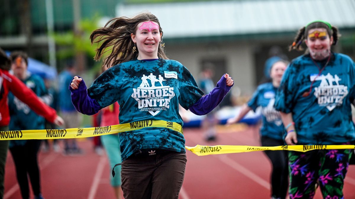 North Central High School junior Nevaiah Draper wins the race Wednesday during adaptive field day at Shadle Park High School.  (Kathy Plonka/The Spokesman-Review)