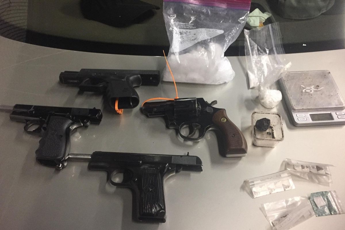 These guns were seized from a vehicle in the area of 4th Avenue and Thor Street on Friday, March 24, 2017. (Courtesy Spokane Police Department)