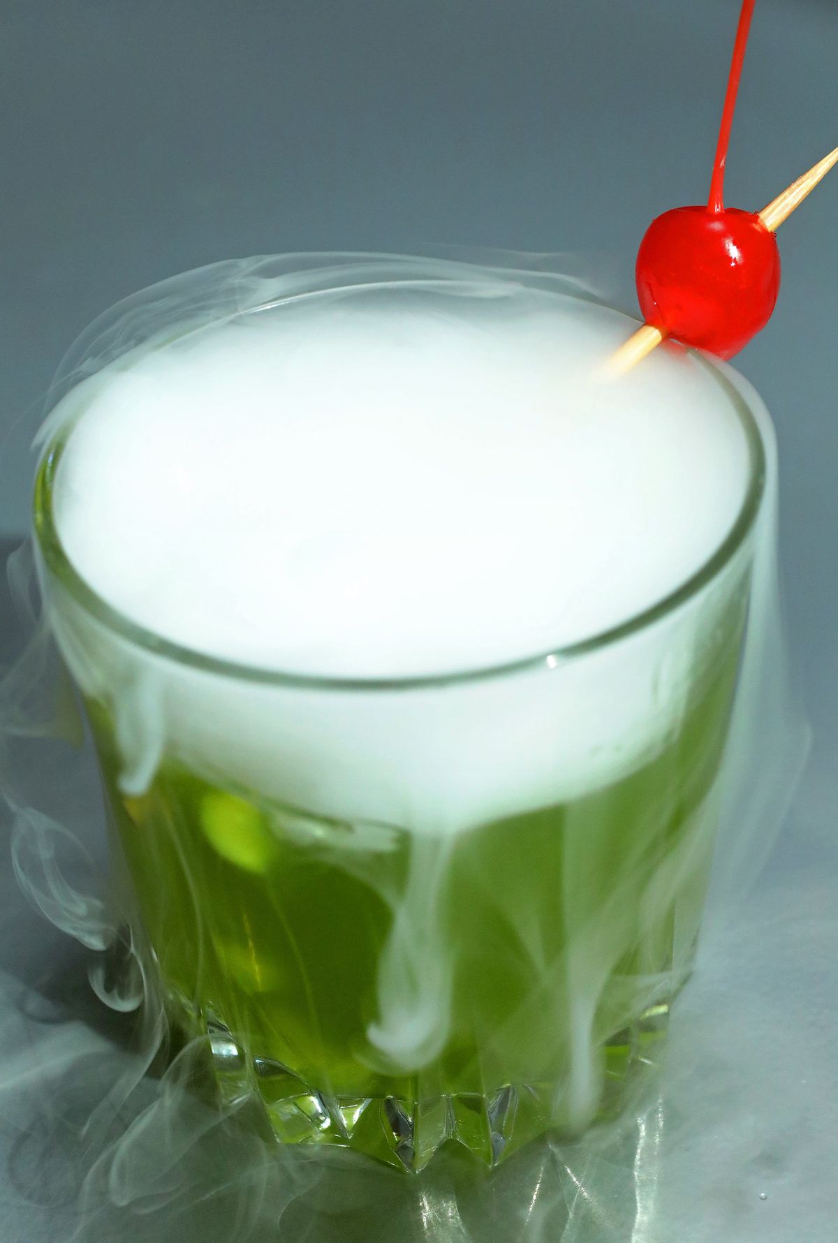 The Witches’ Brew is bright neon green courtesy of Midori, which blends remarkably well with an orange liqueur such as Cointreau or triple sec.  (Christian Gooden/St. Louis Post-Dispatch)
