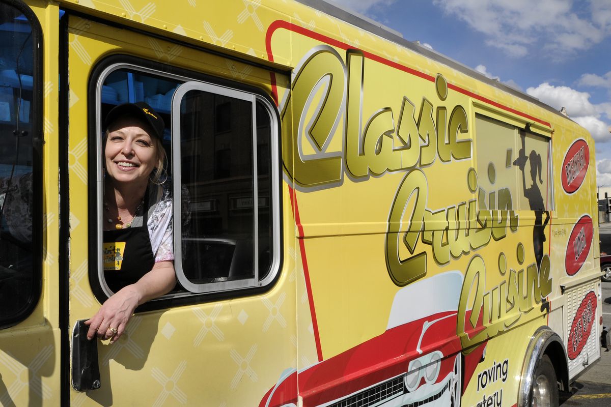 Kerry Peters often parks her 1986 Chevy step van on the corner of Washington and Sprague. The rolling food truck was purchased in Las Vegas and serves up everything scratch made – from burgers to homemade cookies. (Dan Pelle)