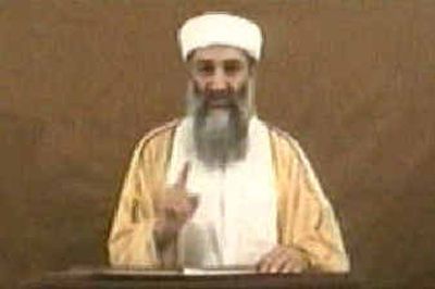 
Osama bin Laden speaks in this image made from an undated video broadcast on Friday by Arab television station Al-Jazeera. In the statement, bin Laden directly admitted for the first time that he ordered the Sept. 11 attacks. 
 (Associated Press / The Spokesman-Review)