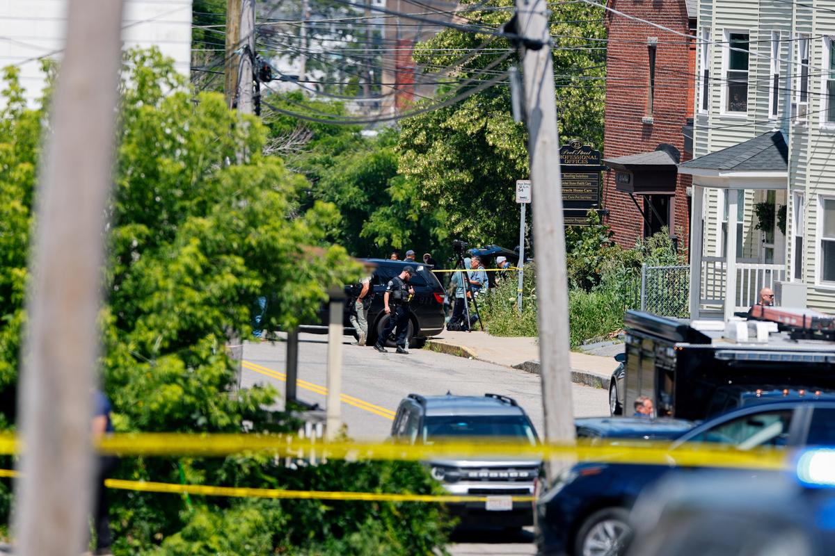 Police work at the scene of a shooting involving Immigration and Customs Enforcement on Monday in Biddeford, Maine.  (Reuters)