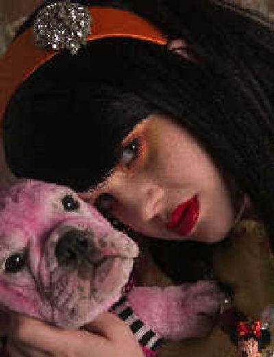 
Kelly Osbourne with Piglet.
 (The Spokesman-Review)