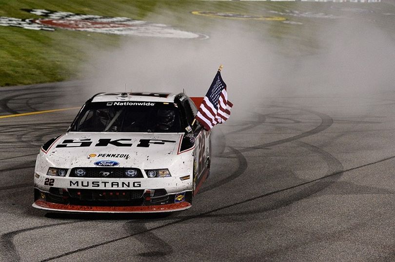 Brad Keselowski, driver of the #22 SKF / Discount Tire Ford, celebrates with a burnout after winning the NASCAR Nationwide Series ToyotaCare 250 at Richmond International Raceway on April 26, 2013 in Richmond, Virginia. (Photo by Patrick Smith/Getty Images)  (Patrick Smith / Getty Images North America)