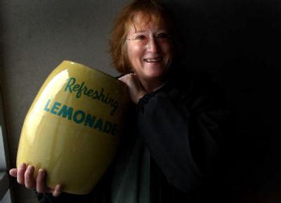 
Marilyn Hutchison holds her lemonade container found at a local sale. 
 (Brian Plonka / The Spokesman-Review)
