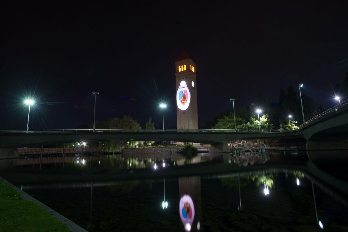 A Freeman High School logo is projected onto Riverfront Park’s Clocktower on Saturday, September 16, 2017, in Spokane, Wash. (Tyler Tjomsland / The Spokesman-Review)