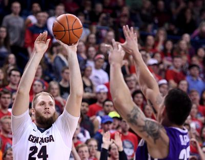 Gonzaga center Przemek Karnowski already knew what it felt like to be top dogs. (Colin Mulvany / The Spokesman-Review)