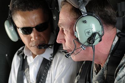 Barack Obama and the top U.S. military commander in Iraq, Gen. David Petraeus, take a helicopter tour of Baghdad on Monday.  (Associated Press / The Spokesman-Review)
