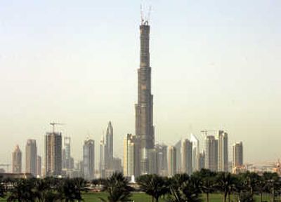 
The Burj tower in Dubai, United Arab Emirates, still under construction, is now the world's tallest free-standing structure. Associated Press
 (Associated Press / The Spokesman-Review)