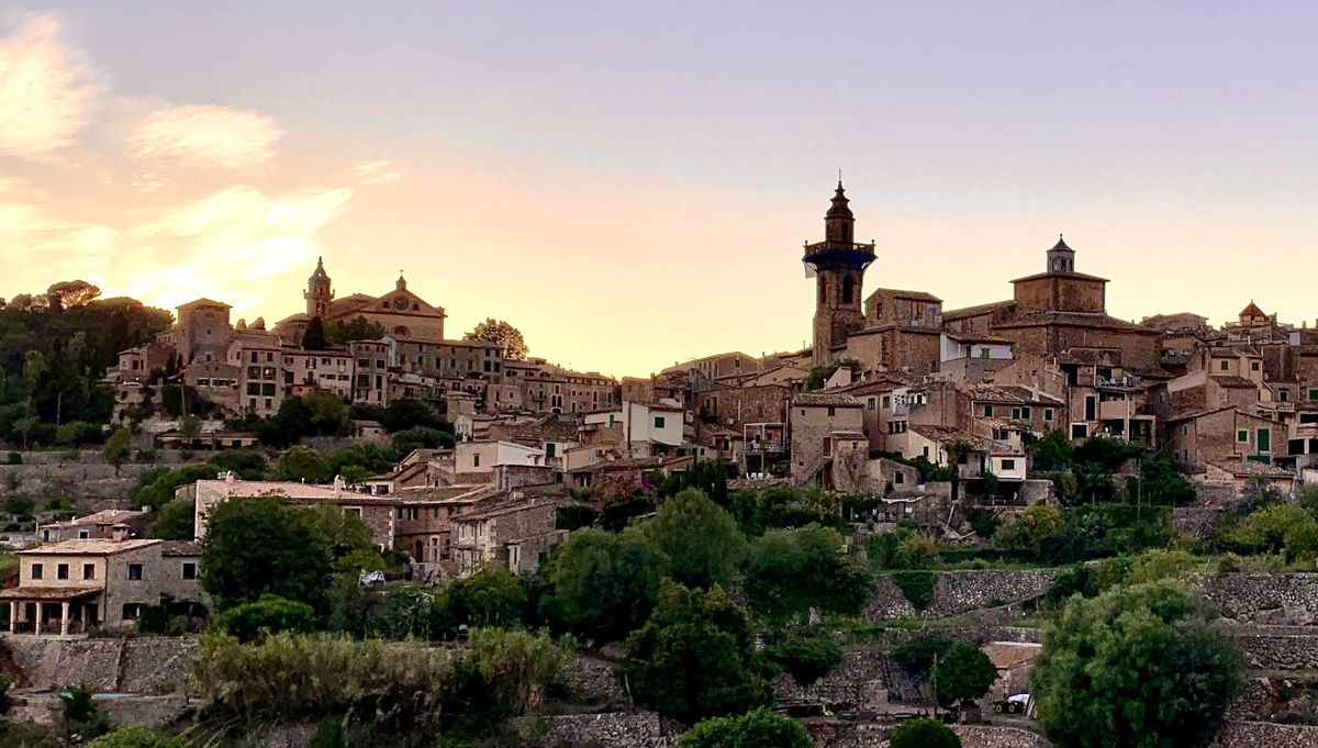 The medieval village of Valldemossa hugs a hillside in the Serra de Tramuntana. UNESCO has listed the mountains as a World Heritage site.  (Frankie Drogin/For the Washington Post )