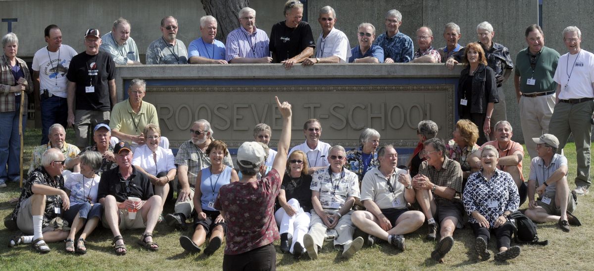 Kim Gardell  prepares to photograph Roosevelt School’s Class of 1959  as they gathered Friday for their 50th reunion.danp@spokesman.com (Dan Pelle / The Spokesman-Review)