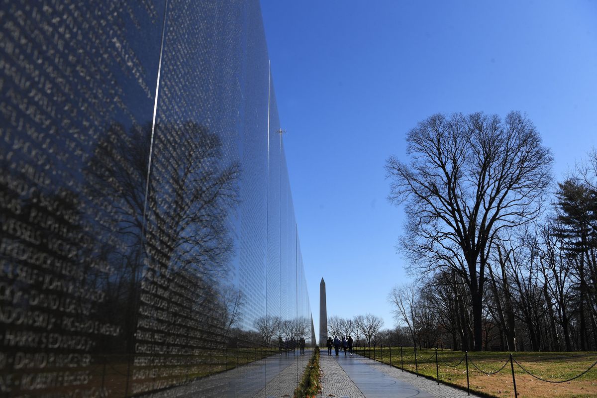 The Vietnam Veterans Memorial in Washington, D.C., was created to honor those who died in the Vietnam War from 1959 to 1975. The design, a V-shaped wall of black granite with names inscribed of those who died, was not liked by some veterans when it was chosen.  (Matt McClain/The Washington Post)