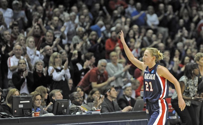 Courtney Vandersloot of Gonzaga comes off the floor for the last time to a standing ovation and hugs from her teammates.  Gonzaga lost to Stanford on Monday, March 28, 2011, 83-60 to end their run in the NCAA Tournament at the Elite Eight. (Christopher Anderson / The Spokesman-Review)