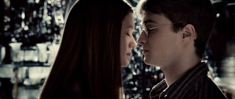 ORG XMIT: NYET177 In this film publicity image released by Warner Bros., Bonnie Wright as Ginny Weasley, left, and Daniel Radcliffe as Harry Potter are shown in a scene from  