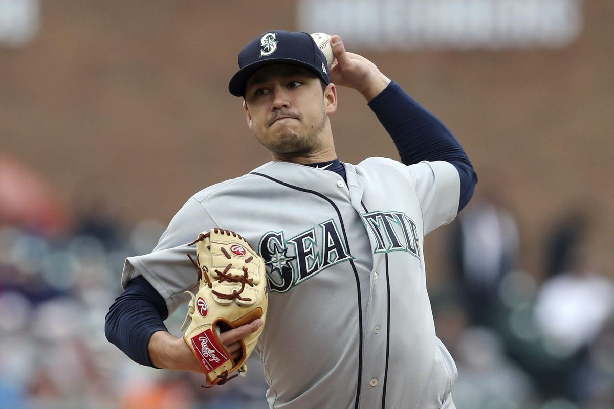 Seattle Mariners starting pitcher Marco Gonzales throws during the first inning of game one of a baseball doubleheader against the Detroit Tigers, Saturday, May 12, 2018, in Detroit. (Carlos Osorio / AP)
