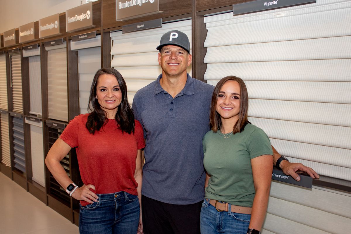 From left, Jessica Warr, Alex Warr and Carly Warr from Spokane Blinds are happy to help customers with their lighting needs. (Dan Cooley/Triple 9 Digital)