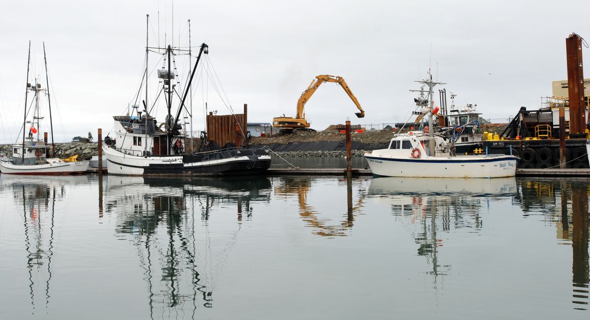 An Oct. 26, 2012 photo shows a large backhoe repairing damage caused by the March, 2011 tsunami at the boat basin in Crescent City, Calif. Once it overcomes some construction setbacks, the port hopes to have the West Coast