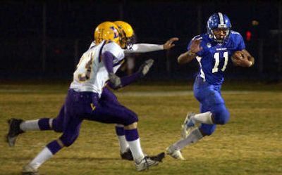 
Coeur d'Alene High running back Kevin Ah-Hi, right, holds the school's career rushing record and is headed to Montana State.
 (Tom Davenport THE SPOKESMAN REVIEW / The Spokesman-Review)