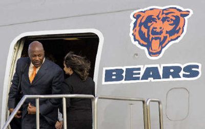 
Chicago Bears coach Lovie Smith arrives in Miami aboard the team's charter plane Sunday.
 (Associated Press / The Spokesman-Review)