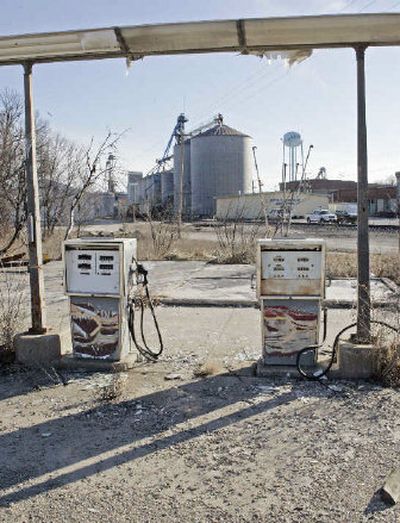 
Grain evelavators and the town's water tower are seen behind abandoned gas pumps near downtown Laddonia, Mo. in northeast Missouri. Construction is under way just north of town for an ethanol plant in the city, just one of six around the country that will be farmer owned. 
 (Associated Press / The Spokesman-Review)