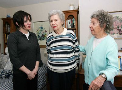 
Social worker Kristine Duranko, left, talks with Luanna Miller, 84, and Martita Van Ness, 88, right, Wednesday at their Atlanta retirement center.  
 (Associated Press / The Spokesman-Review)