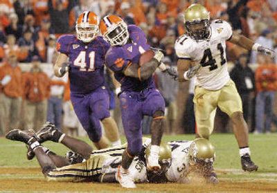 
Clemson's James Davis (1) breaks a tackle. 
 (Associated Press / The Spokesman-Review)