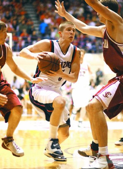 
Gonzaga's Derek Raivio, tournament MVP, drives to the hoop in the first half of Monday's WCC championship game.  
 (Craig Mitchelldyer Special to / The Spokesman-Review)