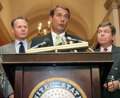 
House Majority Leader John Boehner , center, flanked by Rep. David Dreier, left, and Rep. Roy Blunt on Tuesday expressed support of Rep. Tom DeLay. 
 (Associated Press / The Spokesman-Review)