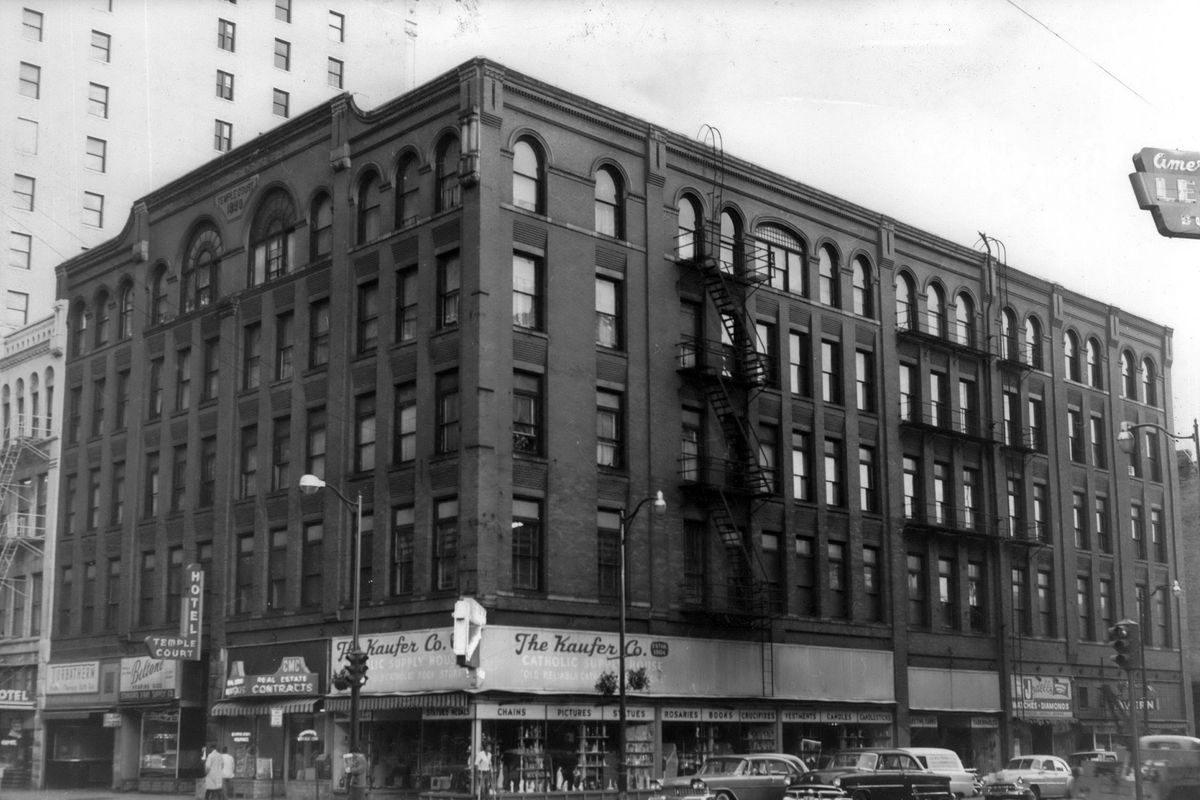 1961: The Temple Court Building housed ground-floor retail and the Temple Court Hotel above, until it was torn down in 1962 to create parking for Old National Bank. (Spokesman-Review Photo Archive / Spokesman-Review photo archive)