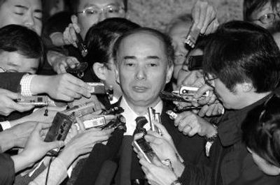 
Japanese chief negotiator Kenichiro Sasae speaks to journalists  before the resumption of six-party talks on North Korea's nuclear program in Beijing today. 
 (Associated Press / The Spokesman-Review)