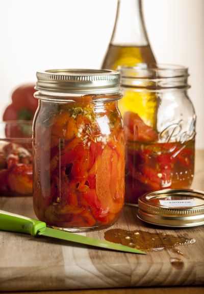 Marinated roasted peppers from Eugenia Bone’s “The Kitchen Ecosystem” can be used to flavor myriad recipes.