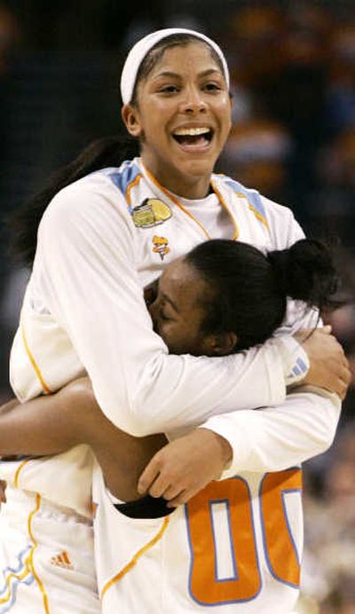 Candace Parker, rear, hugs Shannon Bobbitt after Tennessee beat Stanford Tuesday.Associated Press
(Associated Press / The Spokesman-Review)