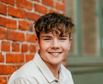 Aedan Reindel, of Coeur d’Alene High School, owes much of his success to his grandmother, the woman who raised him after his mother died when he was 1 year old. 