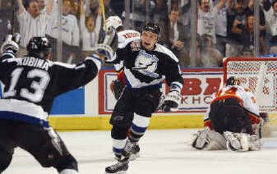 
Ruslan Fedotenko celebrates his first-period goal for Tampa. 
 (Associated Press / The Spokesman-Review)