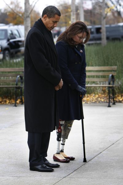 President-elect Obama and Iraq war veteran Tammy Duckworth take part in a wreath-laying ceremony at the Bronze Soldiers Memorial in Chicago.  (Associated Press / The Spokesman-Review)