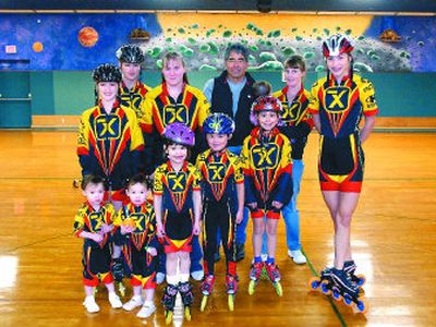 
The Akana family, most of whom are in the inline skating group Team X, includes parents Stacy and Roni Akana, back row center and center right, and kids Natasha, 12, twins Zakayla and Xalia, 2, Zephaneah, 14, Stephanie, 19, Annastasiah, 4, Neahmiah, 6, Makailah, 9, Zemikah, 7 months, and Xion, 16.  One other son, Scott, is in the Marines and serving overseas. 
 (JESSE TINSLEY Photos / The Spokesman-Review)