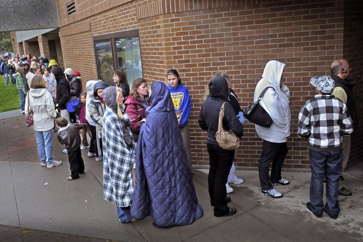 A long line stretches from the front door of Shiloh Hills. (The Spokesman-Review)