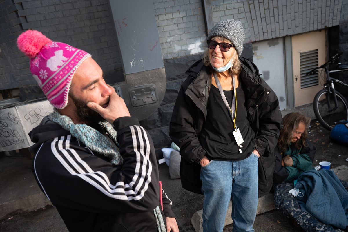Ilze Zarins-Ilgen, on right, is a fierce advocate for the homeless through community outreach at the CHAS Denny Murphy Clinic. She starts her day at 6 a.m. and is a quiet presence behind the scenes of homeless life.  (COLIN MULVANY/THE SPOKESMAN-REVI)