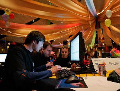 
The team from Saratov State University in Russia joins more than 80 international teams competing in the final round of the ACM International Collegiate Programming Contest on Wednesday.
 (Associated Press / The Spokesman-Review)