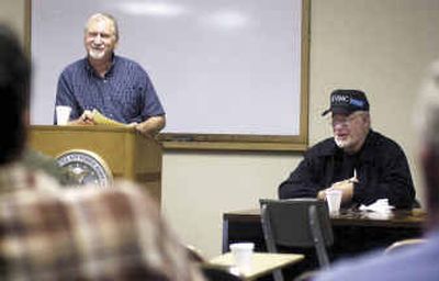
Kootenai Amateur Radio Society president Randy Carlson, left and Jack McElroy run a meeting of the group in the Civil Air patrol building at the Coeur d'Alene Airport in May. 
 (Tom Davenport/ / The Spokesman-Review)