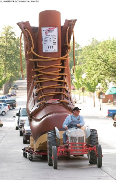 The Red Wing Shoe Company in Danville, Kentucky, paraded a giant boot, made for the company’s 100th anniversary, to a new flagship store and museum in July 2009. Red Wing Shoes long has touted its “Made in USA” roots. (Chap Achen)